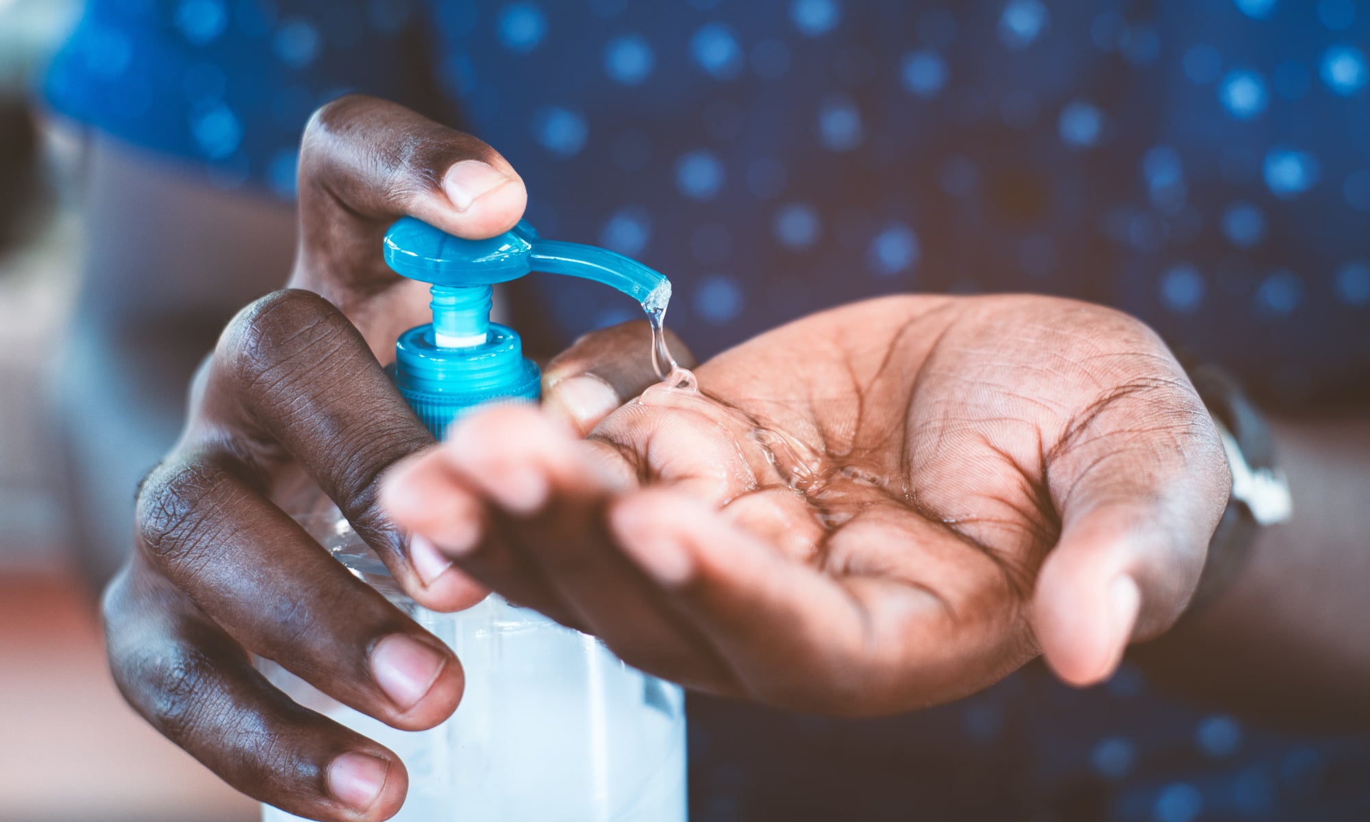 Using Hand Sanitiser