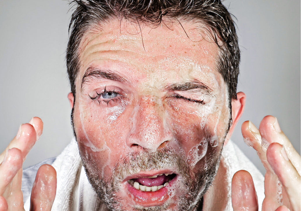 lathering up and washing face